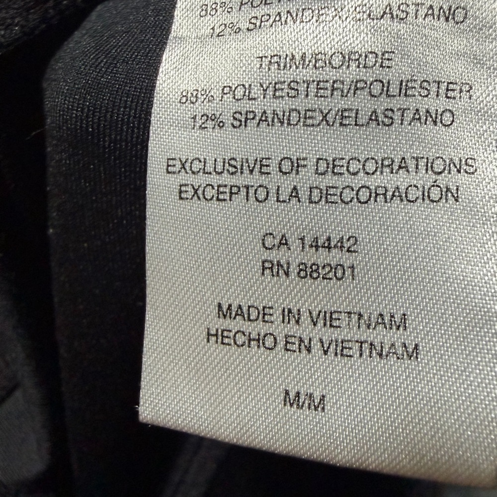 Black Garment with Trim Details